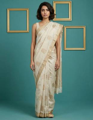 beige chain stitch crossstitch embroidered tussar art silk festive wear saree with unstitched blouse 1