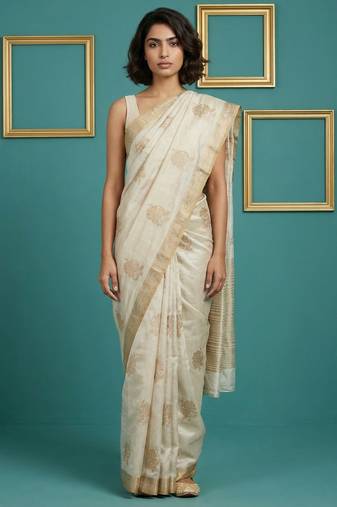 beige chain stitch crossstitch embroidered tussar art silk festive wear saree with unstitched blouse