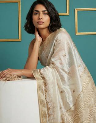 beige chain stitch cutwork embroidered tussar art silk festive wear saree with unstitched blouse 4