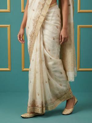 beige chain stitch cutwork embroidered tussar art silk festive wear saree with unstitched blouse 5