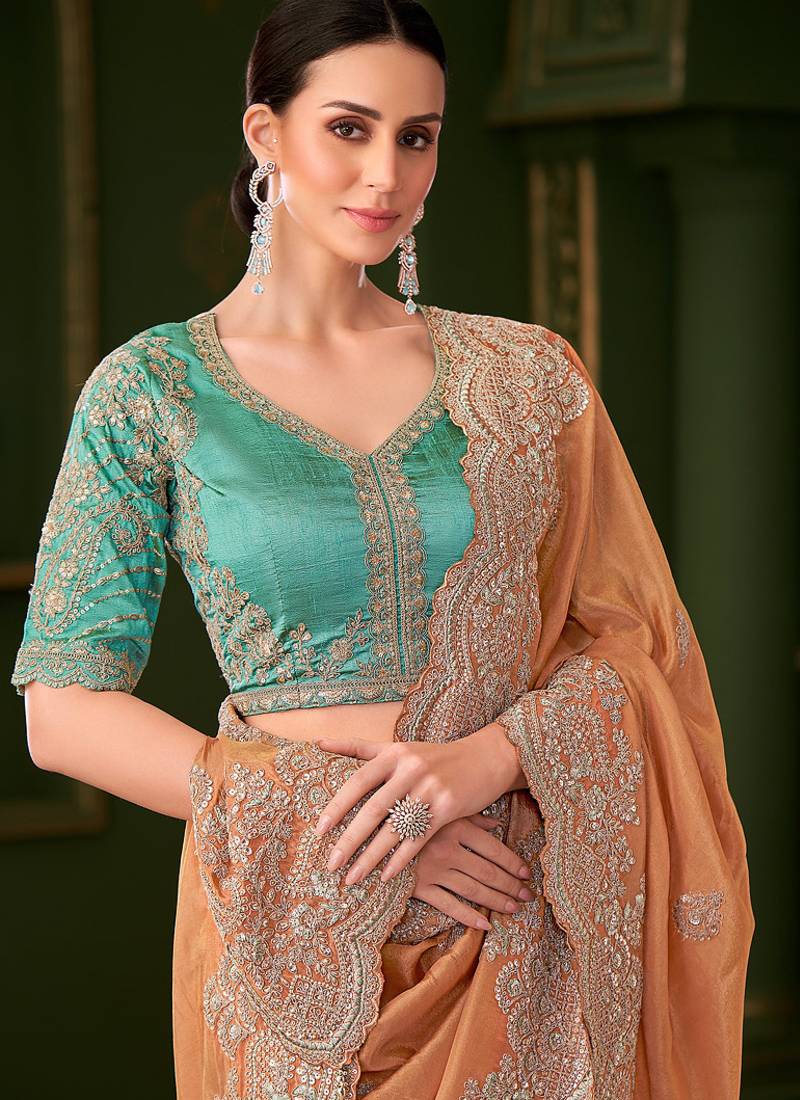 Saffron pure viscose georgette silk saree & tussar silk blouse