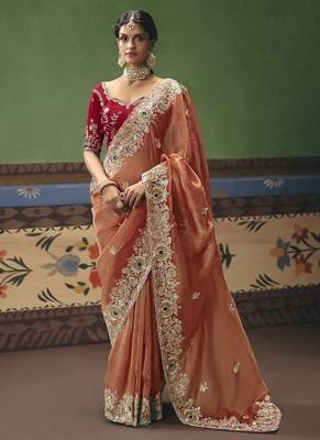 Orange designer embroidery fancy occasion wear saree 1