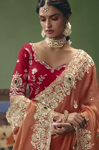 Orange designer embroidery fancy occasion wear saree