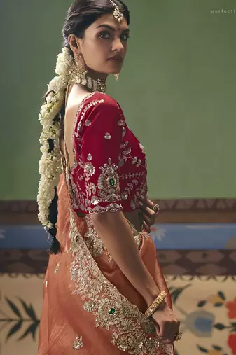 Orange designer embroidery fancy occasion wear saree