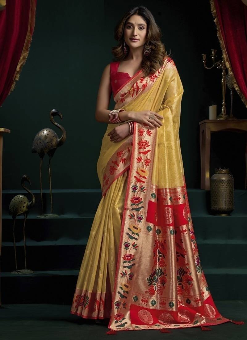 Yellow tissue paithani saree mina with lotus zari border