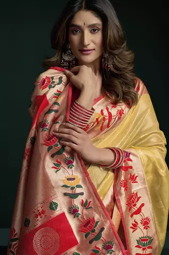 Yellow tissue paithani saree mina with lotus zari border