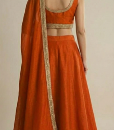 burnt orange silk designer lehenga set with gold border dupatta