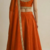 burnt orange silk designer lehenga set with gold border dupatta