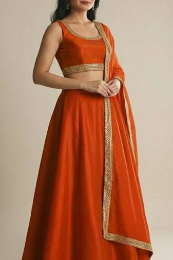 burnt orange silk designer lehenga set with gold border dupatta