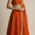 burnt orange silk designer lehenga set with gold border dupatta