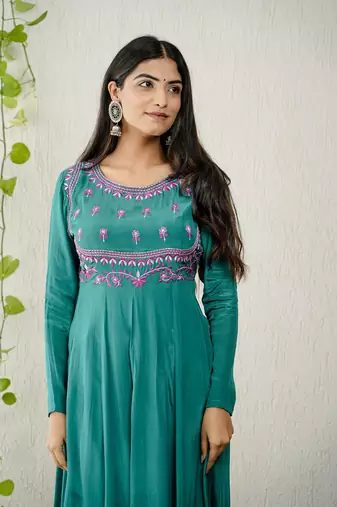 Green crepe embroidered kurta sets