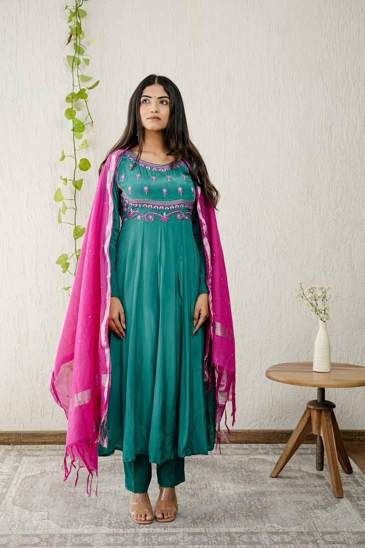 Green crepe embroidered kurta sets