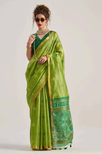 green premium art silk patola saree with traditional weaving design