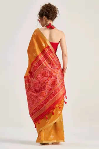 orange premium art silk blend patola saree with weaving design
