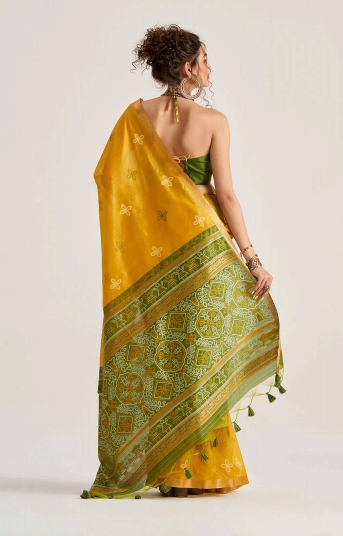 yellow premium art silk patola saree with traditional weaving design