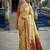 Beige ready to wear jacquard silk  saree and ready to wear jacquard silk  blouse with cup