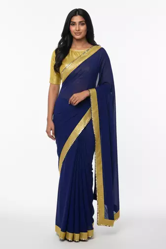 Navy blue sequenced lace georgette saree with blouse piece.