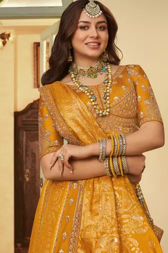Grand Mustard Yellow Sequins Embroidery Banarasi Silk Haldi Wear Lehenga Choli