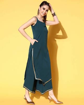 Green solid poly crepe kurta sets 4