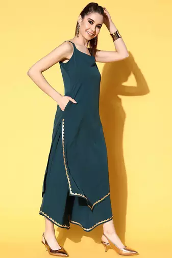 Green solid poly crepe kurta sets