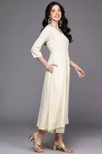 Off white solid poly crepe kurta sets