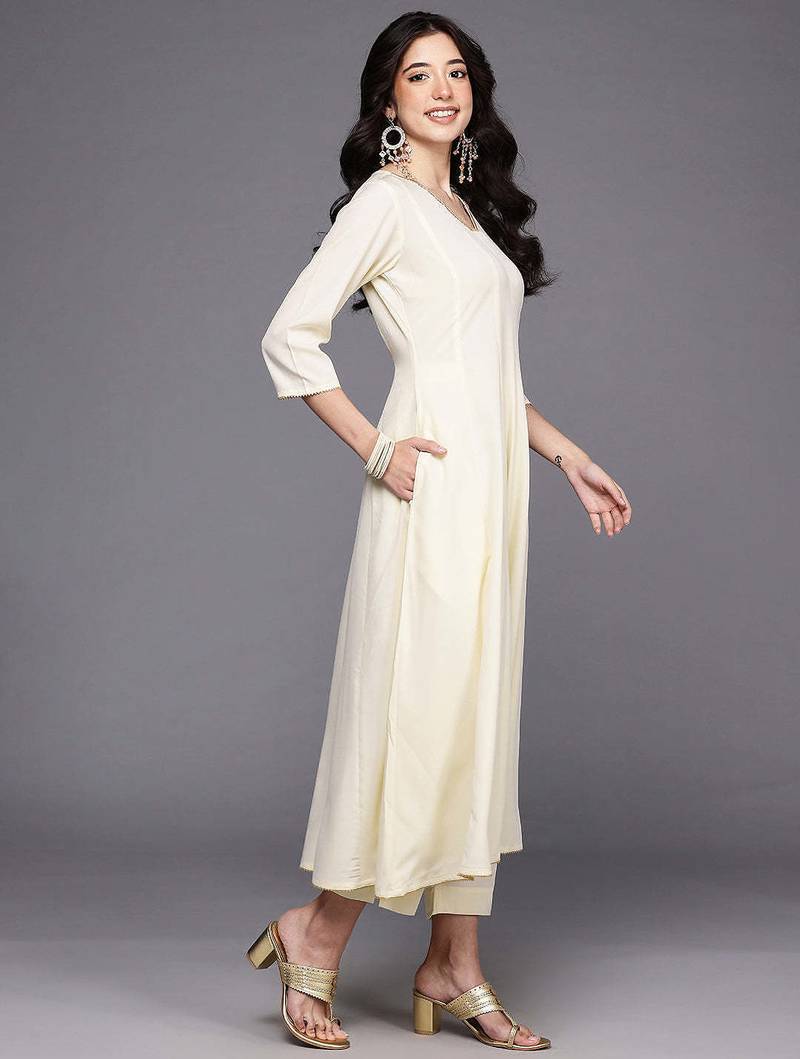Off white solid poly crepe kurta sets