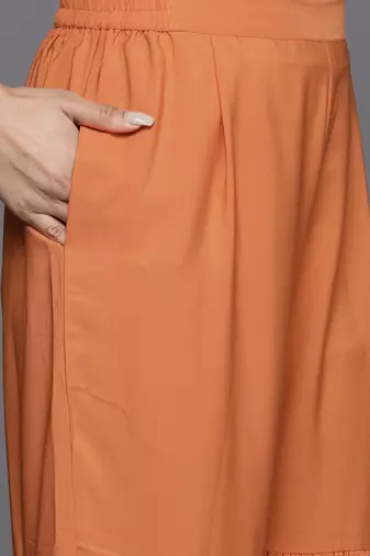 Orange printed poly georgette kurta sets