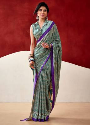 green fancy printed dull satin saree with matching blouse 1