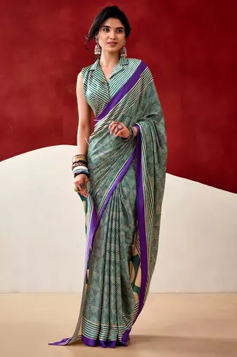 green fancy printed dull satin saree with matching blouse