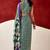 green fancy printed dull satin saree with matching blouse