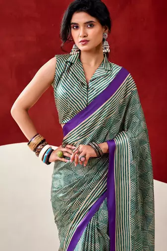 green fancy printed dull satin saree with matching blouse