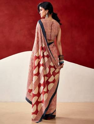 orange fancy printed dull satin saree with matching blouse 2