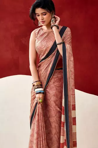 orange fancy printed dull satin saree with matching blouse
