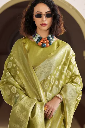 light green elegant tissue silk blend saree  lightweight & luxurious fabric
