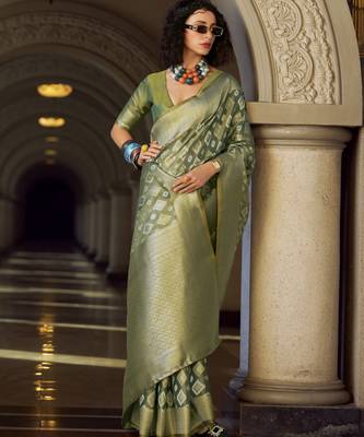 green elegant tissue silk blend saree  lightweight & luxurious fabric 1