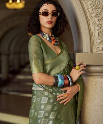 green elegant tissue silk blend saree  lightweight & luxurious fabric 3
