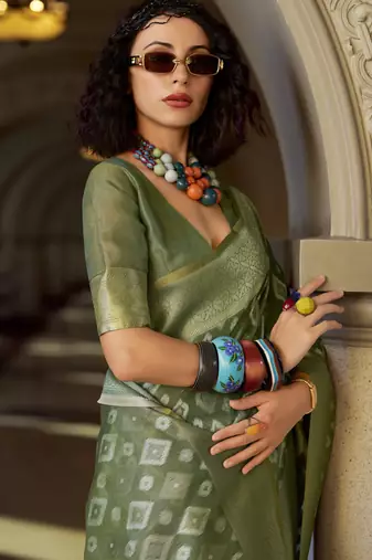 green elegant tissue silk blend saree  lightweight & luxurious fabric