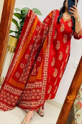 Floral printed orange  cotton  kurta trouser and dupatta set 2
