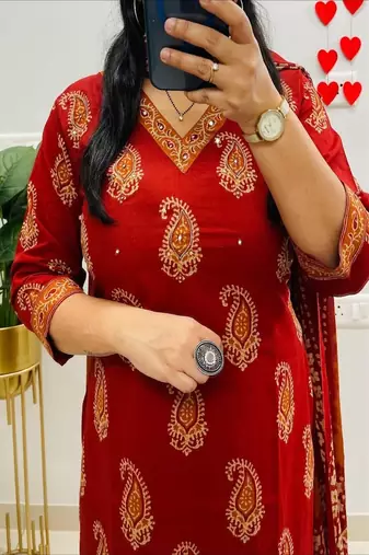 Floral printed orange  cotton  kurta trouser and dupatta set