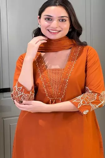 Floral embroidered orange  cotton  kurta trouser and dupatta set
