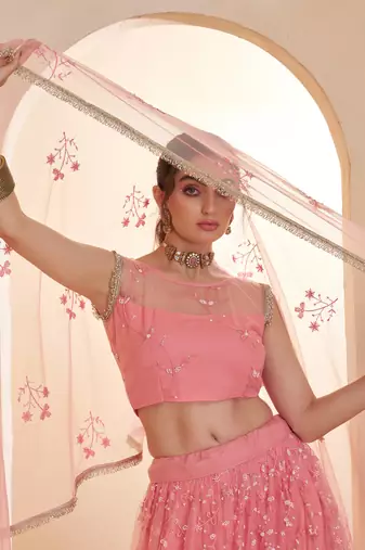 Glowing Pink Thread Embroidered Net Reception Wear Lehenga Choli