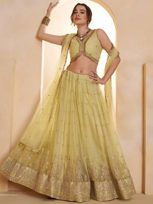 Sparkling Yellow Thread Embroidered Net Engagement Wear Lehenga Choli 1