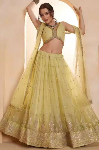 Sparkling Yellow Thread Embroidered Net Engagement Wear Lehenga Choli
