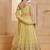 Sparkling Yellow Thread Embroidered Net Engagement Wear Lehenga Choli
