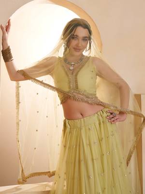Sparkling Yellow Thread Embroidered Net Engagement Wear Lehenga Choli 6