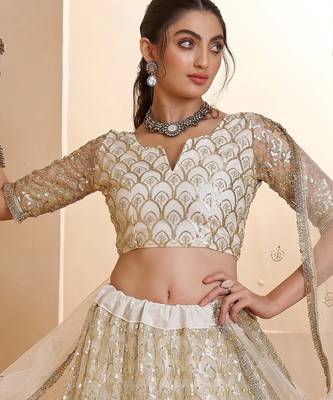 Fantastic Off-White Thread Embroidered Net Wedding Wear Lehenga Choli 3