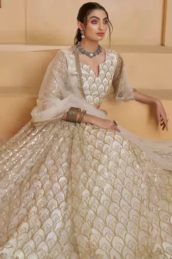 Fantastic Off-White Thread Embroidered Net Wedding Wear Lehenga Choli