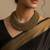Nvr women vintage braided beads golden coloured necklace
