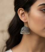 Nvr women german silver oxidised dome shaped jhumka earrings