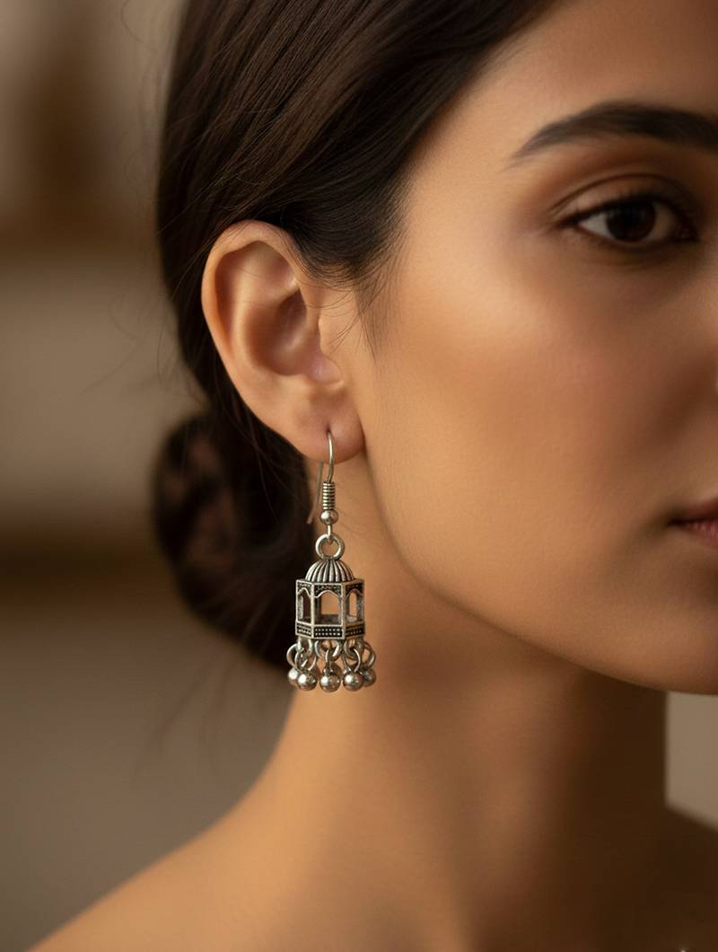 Nvr women traditional oxidized silver plated temple style jhumka earrings